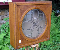 Oak wall cabinet/clock case with beveled glass front